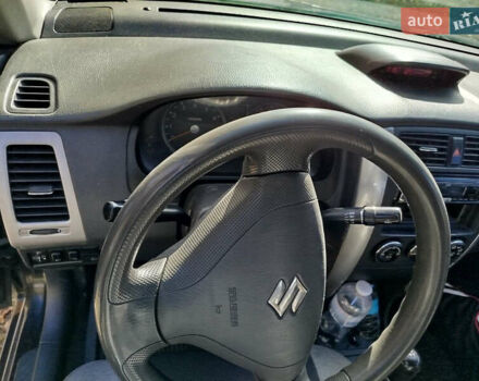 Черный Сузуки Лиана, объемом двигателя 1.6 л и пробегом 300 тыс. км за 3900 $, фото 18 на Automoto.ua