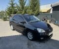 Чорний Сузукі Ліана, об'ємом двигуна 1.6 л та пробігом 115 тис. км за 4550 $, фото 4 на Automoto.ua