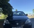 Черный Сузуки Лиана, объемом двигателя 1.6 л и пробегом 238 тыс. км за 4500 $, фото 1 на Automoto.ua