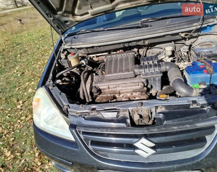 Черный Сузуки Лиана, объемом двигателя 1.6 л и пробегом 300 тыс. км за 3900 $, фото 14 на Automoto.ua