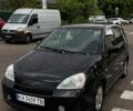Черный Сузуки Лиана, объемом двигателя 1.6 л и пробегом 236 тыс. км за 4000 $, фото 1 на Automoto.ua
