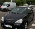 Черный Сузуки Лиана, объемом двигателя 1.6 л и пробегом 236 тыс. км за 3600 $, фото 1 на Automoto.ua