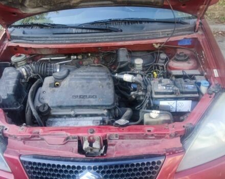 Червоний Сузукі Ліана, об'ємом двигуна 1.6 л та пробігом 390 тис. км за 2039 $, фото 1 на Automoto.ua