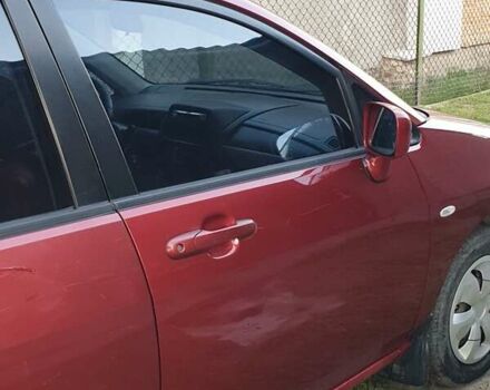 Червоний Сузукі Ліана, об'ємом двигуна 1.6 л та пробігом 290 тис. км за 3500 $, фото 24 на Automoto.ua