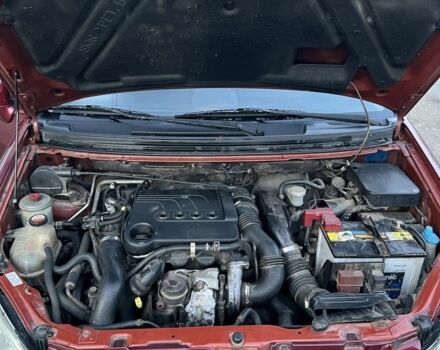 Червоний Сузукі Ліана, об'ємом двигуна 1.4 л та пробігом 235 тис. км за 3150 $, фото 7 на Automoto.ua