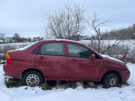 Красный Сузуки Лиана, объемом двигателя 1.3 л и пробегом 130 тыс. км за 473 $, фото 1 на Automoto.ua