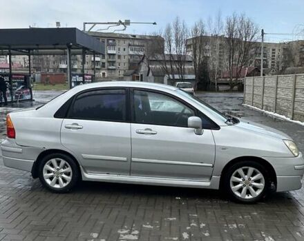 Серый Сузуки Лиана, объемом двигателя 1.3 л и пробегом 320 тыс. км за 2800 $, фото 2 на Automoto.ua