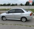 Серый Сузуки Лиана, объемом двигателя 1.59 л и пробегом 273 тыс. км за 4350 $, фото 3 на Automoto.ua
