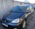 Серый Сузуки Лиана, объемом двигателя 1.6 л и пробегом 270 тыс. км за 5150 $, фото 1 на Automoto.ua