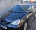 Серый Сузуки Лиана, объемом двигателя 1.6 л и пробегом 270 тыс. км за 5300 $, фото 1 на Automoto.ua