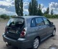 Серый Сузуки Лиана, объемом двигателя 1.6 л и пробегом 232 тыс. км за 4950 $, фото 1 на Automoto.ua