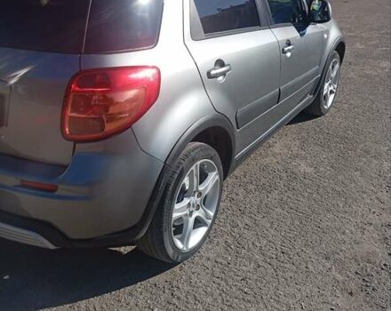 Серый Сузуки Лиана, объемом двигателя 1.59 л и пробегом 208 тыс. км за 7850 $, фото 6 на Automoto.ua