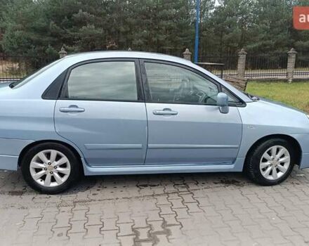 Синий Сузуки Лиана, объемом двигателя 1.6 л и пробегом 252 тыс. км за 3700 $, фото 3 на Automoto.ua