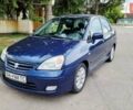 Синий Сузуки Лиана, объемом двигателя 1.59 л и пробегом 258 тыс. км за 3950 $, фото 1 на Automoto.ua