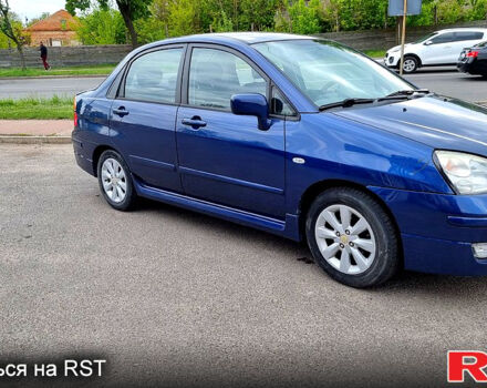 Синий Сузуки Лиана, объемом двигателя 1.6 л и пробегом 250 тыс. км за 4500 $, фото 2 на Automoto.ua