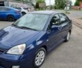 Синий Сузуки Лиана, объемом двигателя 1.59 л и пробегом 258 тыс. км за 4000 $, фото 1 на Automoto.ua