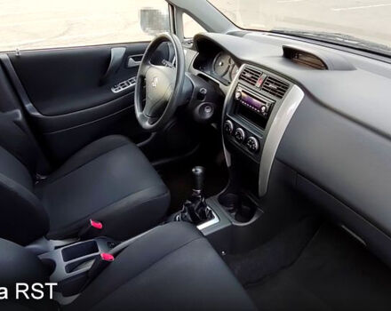 Синий Сузуки Лиана, объемом двигателя 1.6 л и пробегом 250 тыс. км за 4500 $, фото 5 на Automoto.ua