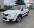 Белый Сузуки СХ4, объемом двигателя 1.6 л и пробегом 287 тыс. км за 5500 $, фото 1 на Automoto.ua