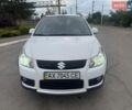 Белый Сузуки СХ4, объемом двигателя 1.6 л и пробегом 287 тыс. км за 5500 $, фото 3 на Automoto.ua
