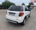 Белый Сузуки СХ4, объемом двигателя 1.6 л и пробегом 287 тыс. км за 5500 $, фото 10 на Automoto.ua