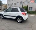 Белый Сузуки СХ4, объемом двигателя 1.6 л и пробегом 287 тыс. км за 5500 $, фото 7 на Automoto.ua