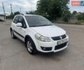 Белый Сузуки СХ4, объемом двигателя 1.6 л и пробегом 287 тыс. км за 5500 $, фото 14 на Automoto.ua