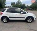 Белый Сузуки СХ4, объемом двигателя 1.6 л и пробегом 287 тыс. км за 5500 $, фото 12 на Automoto.ua