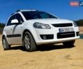 Белый Сузуки СХ4, объемом двигателя 1.59 л и пробегом 246 тыс. км за 6199 $, фото 1 на Automoto.ua