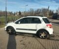 Белый Сузуки СХ4, объемом двигателя 1.6 л и пробегом 115 тыс. км за 7000 $, фото 1 на Automoto.ua