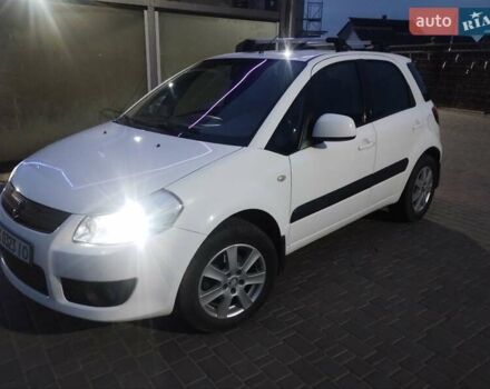 Белый Сузуки СХ4, объемом двигателя 1.59 л и пробегом 246 тыс. км за 7300 $, фото 1 на Automoto.ua