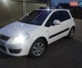 Белый Сузуки СХ4, объемом двигателя 1.59 л и пробегом 246 тыс. км за 7300 $, фото 1 на Automoto.ua