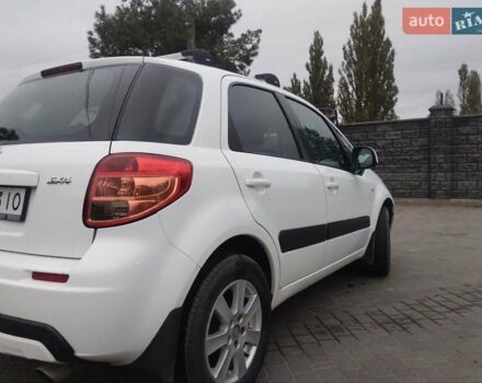 Белый Сузуки СХ4, объемом двигателя 1.59 л и пробегом 246 тыс. км за 7300 $, фото 5 на Automoto.ua