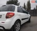 Белый Сузуки СХ4, объемом двигателя 1.59 л и пробегом 246 тыс. км за 7300 $, фото 5 на Automoto.ua