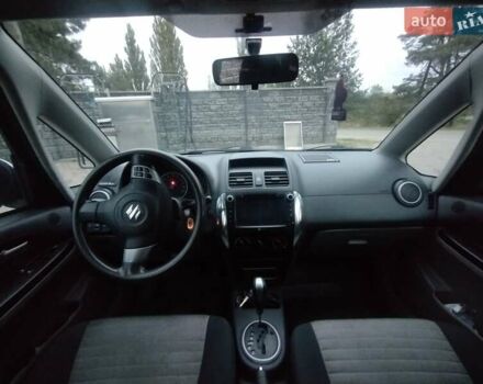 Белый Сузуки СХ4, объемом двигателя 1.59 л и пробегом 246 тыс. км за 7300 $, фото 2 на Automoto.ua