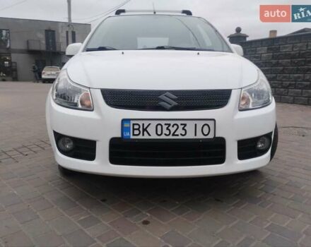 Белый Сузуки СХ4, объемом двигателя 1.59 л и пробегом 246 тыс. км за 7300 $, фото 9 на Automoto.ua