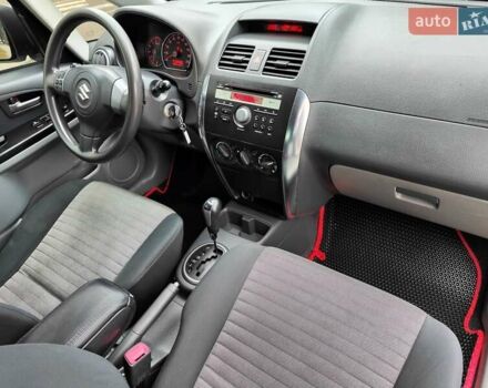 Белый Сузуки СХ4, объемом двигателя 1.6 л и пробегом 192 тыс. км за 5490 $, фото 46 на Automoto.ua