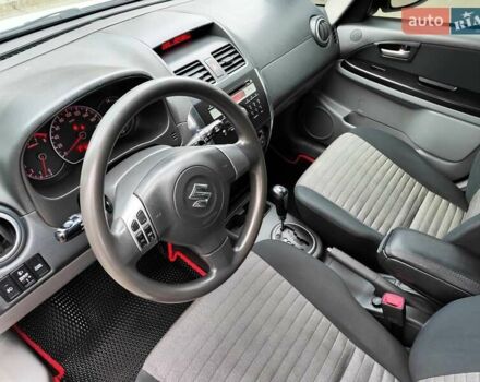 Белый Сузуки СХ4, объемом двигателя 1.6 л и пробегом 192 тыс. км за 5490 $, фото 32 на Automoto.ua