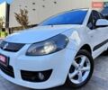 Белый Сузуки СХ4, объемом двигателя 1.6 л и пробегом 192 тыс. км за 5990 $, фото 1 на Automoto.ua