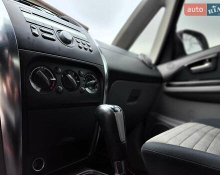 Белый Сузуки СХ4, объемом двигателя 1.6 л и пробегом 192 тыс. км за 5490 $, фото 37 на Automoto.ua