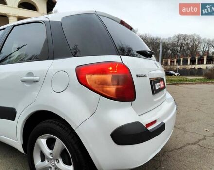 Белый Сузуки СХ4, объемом двигателя 1.6 л и пробегом 192 тыс. км за 5490 $, фото 12 на Automoto.ua