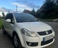 Белый Сузуки СХ4, объемом двигателя 1.59 л и пробегом 118 тыс. км за 7900 $, фото 1 на Automoto.ua