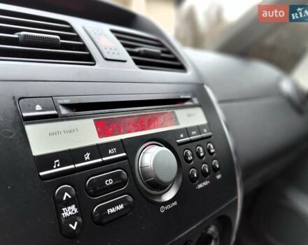 Белый Сузуки СХ4, объемом двигателя 1.6 л и пробегом 192 тыс. км за 5490 $, фото 36 на Automoto.ua