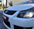 Белый Сузуки СХ4, объемом двигателя 1.6 л и пробегом 192 тыс. км за 5990 $, фото 1 на Automoto.ua