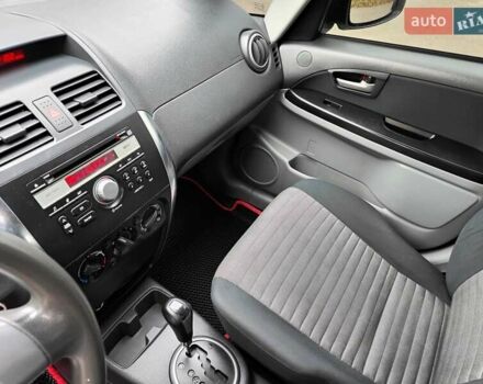 Белый Сузуки СХ4, объемом двигателя 1.6 л и пробегом 192 тыс. км за 5490 $, фото 35 на Automoto.ua