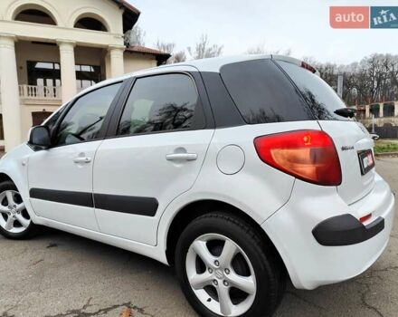 Белый Сузуки СХ4, объемом двигателя 1.6 л и пробегом 192 тыс. км за 5490 $, фото 10 на Automoto.ua