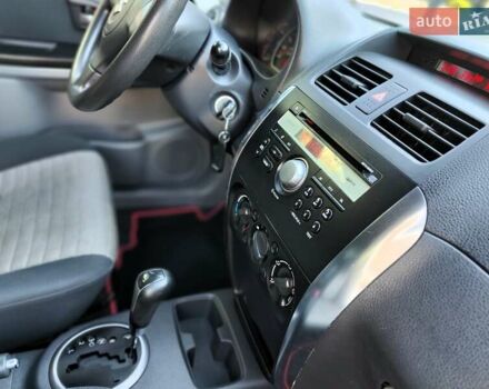 Белый Сузуки СХ4, объемом двигателя 1.6 л и пробегом 192 тыс. км за 5990 $, фото 51 на Automoto.ua