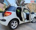 Белый Сузуки СХ4, объемом двигателя 1.6 л и пробегом 192 тыс. км за 5990 $, фото 20 на Automoto.ua