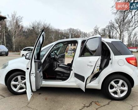 Белый Сузуки СХ4, объемом двигателя 1.6 л и пробегом 192 тыс. км за 5490 $, фото 7 на Automoto.ua