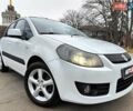 Белый Сузуки СХ4, объемом двигателя 1.6 л и пробегом 192 тыс. км за 5490 $, фото 1 на Automoto.ua