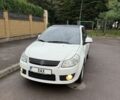 Белый Сузуки СХ4, объемом двигателя 1.6 л и пробегом 176 тыс. км за 5500 $, фото 1 на Automoto.ua
